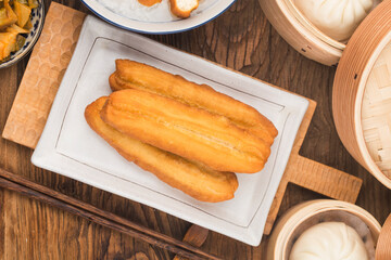 Chinese fried dough or deep-fried dough stick， Popular street food.
