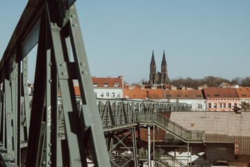 view of the vysehrad church from the railway bridge