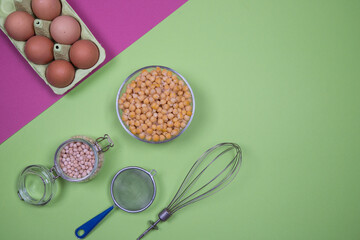 The vegan concept of replacing eggs with Aquafaba - a decoction of chickpeas. Copy space