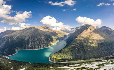 Aerial drone shot of Schlegeisspeicher glacier reservoir in zillertal alps in Austria