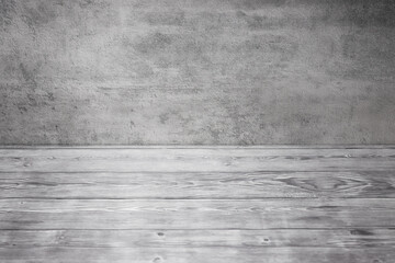 Gray studio backdrop. Wooden table and textured wall. Empty background texture.