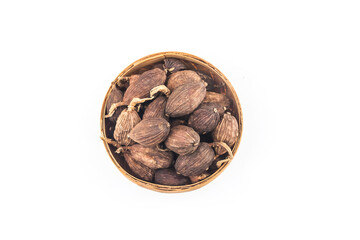 Black cardamom on a white background