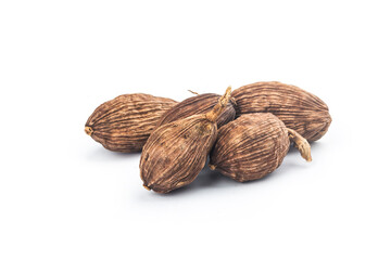Black cardamom on a white background