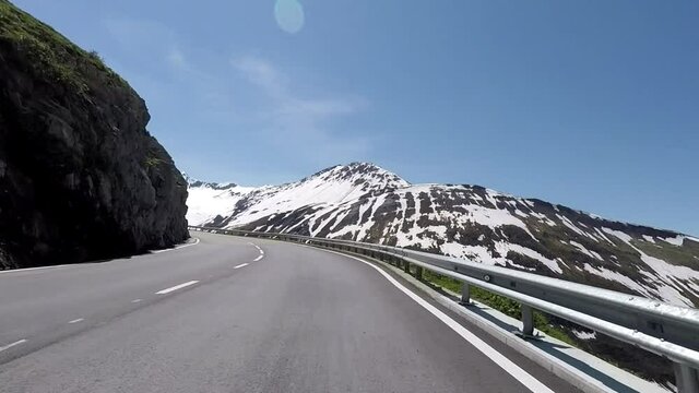 Motorbike curves driving on mountain roads by motorcycle to the Furka Pass in the Swiss Alps. Includes three different video sequences!