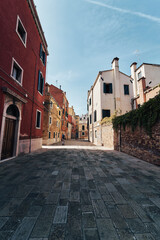 Fototapeta na wymiar Colorful houses and buildings in Venice in daylight summer atmosphere, Italy