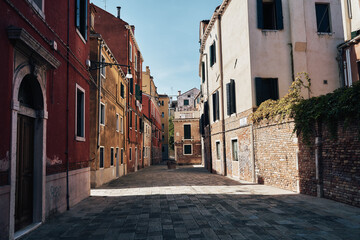 Plakat Colorful houses and buildings in Venice in daylight summer atmosphere, Italy