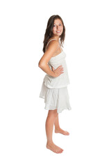 Full length portrait of a happy young woman wearing a white top and a short summer skirt, isolated on white studio background