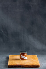 Obraz na płótnie Canvas small jars with condiments and tags