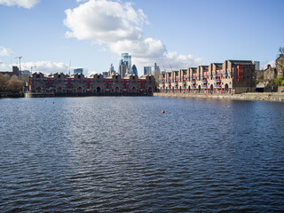 River Thames and Canary Wharf skyline, London, UK, dock
