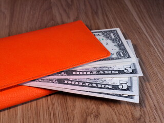 Wallet with dollars. Purchasing power of the population.