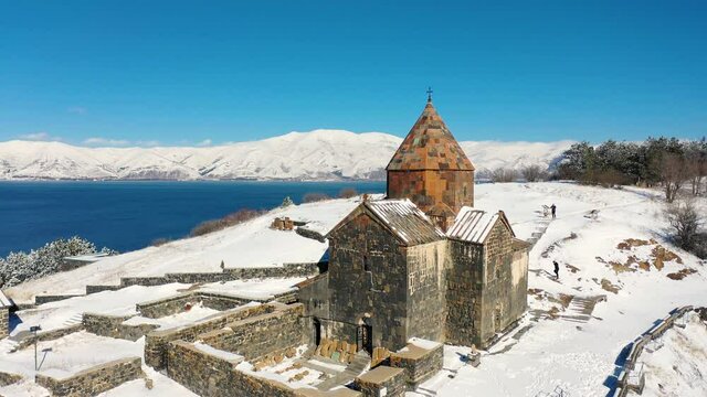 Aerial shot monastery in winter time. 	 Armenian Apostolic Church Hayravank, Gegharkunik Province one of is oldest monastery in Armenia. Near the lake of Sevan.  It was built in 9-12 centuries.