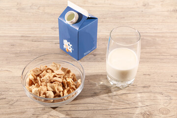 Healthy food - a man eats breakfast with cereals and milk.