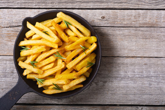 French fries with rosemary and ketchup
