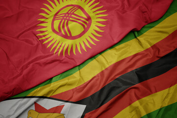waving colorful flag of zimbabwe and national flag of kyrgyzstan.