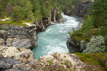 A river flowing through the canyon in Norwegian nature