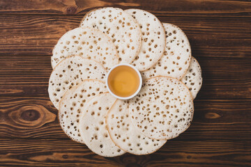 Moroccan traditional eating . Pancakes with honey