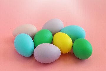 Easter. Easter eggs on pink background. Сolorful decorative eggs. Holiday and Easter concept.