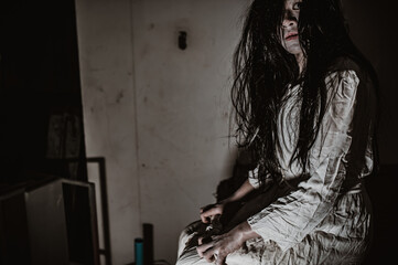 Portrait of asian woman make up ghost,Scary horror scene for background,Halloween festival...