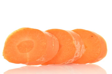 Three slices of fresh organic, unpeeled carrots, close-up, isolated on white.