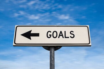 Goals road sign, arrow on blue sky background. One way blank road sign with copy space. Arrow on a pole pointing in one direction.