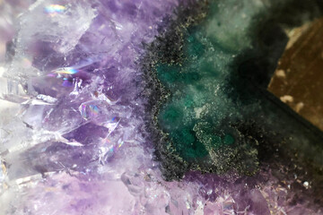 macro photo of amethyst stone, magenta and green layers, semi precious minerals, natural texture and backgrounds, selective focus