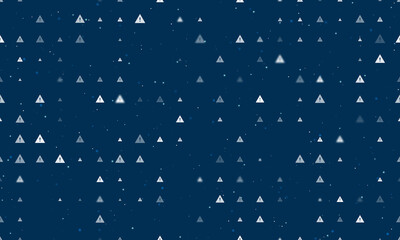Seamless background pattern of evenly spaced white warning symbols of different sizes and opacity. Vector illustration on dark blue background with stars