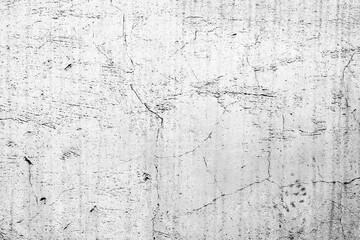 Texture of a concrete wall with cracks and scratches which can be used as a background