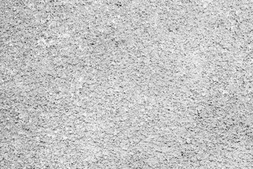 Texture of a concrete wall with cracks and scratches which can be used as a background