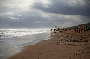 Image of beach a cloudy day and tide