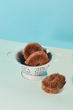 High angle of assorted eco friendly hygienic supplies for skin treatment in shower placed on blue background in studio