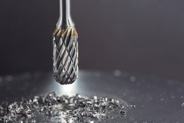 Milling сutter and drill bit make sink in hole in steel billet. Locksmith work.