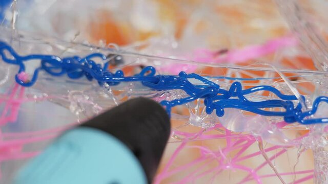3D pen in a child's hand.
