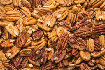 Tasty pecan-nut background. Top view.
