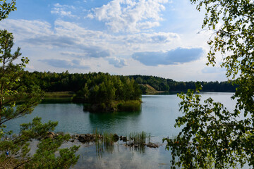 Fototapeta na wymiar Ukrainian basalt lake in summer, a lake on the site of a quarry.