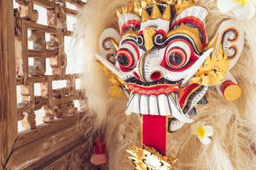 Authentic Asian lion figure with fur and colorful ornament on face used during cultural and religious celebrations and symbolizing luck and fortune placed in hotel in Taiwan