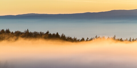 Sunset mood above the clouds