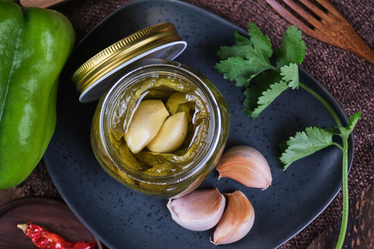 Vegan baked eggplants in crystal jar.