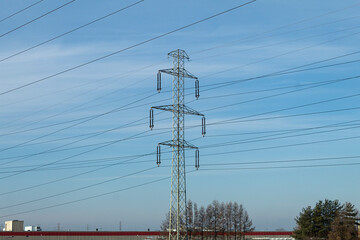 High voltage electrical wires on metal poles