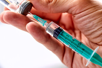  Vaccine in vial with syringe