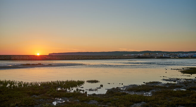 Scenic view of sunset over river mouth in Barbate, Andalusia, Spain