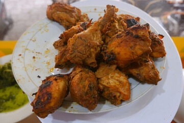 Grilled chicken is typical of Padang restaurants. Grilled chicken with traditional Indonesian spices