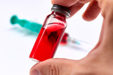  Vaccine in vial with syringe