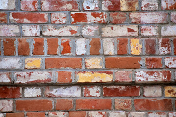 an old red brick wall. ancient building