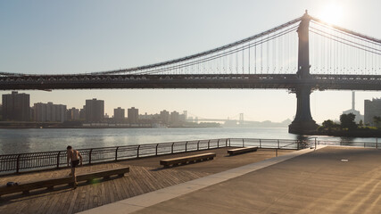 Manhattan Bridge and east river in new york city