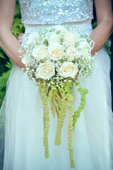White wedding bouquet with wedding dress