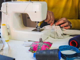 Woman Using Sewing Machine