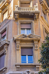 Architectural fragments of Rome Traditional Old house with sculptures in the City Old town. Rome, Lazio, Italy, Europe.