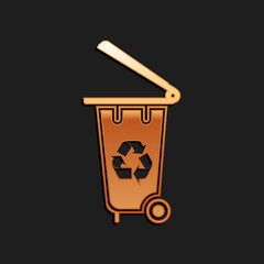 Gold Recycle bin with recycle symbol icon isolated on black background. Trash can icon. Garbage bin sign. Recycle basket icon. Long shadow style. Vector.