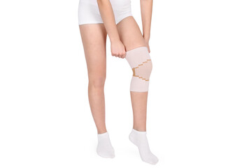 Knee Support Brace on leg isolated on white background. Orthopedic Anatomic Orthosis. Braces for...