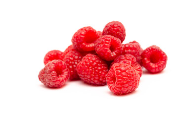 Appetizing red raspberry berries close up